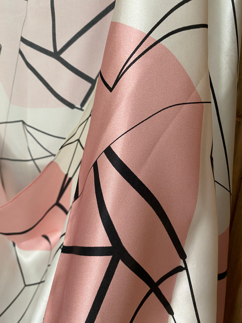 Chaqueta de seda fluida con estampado geométrico