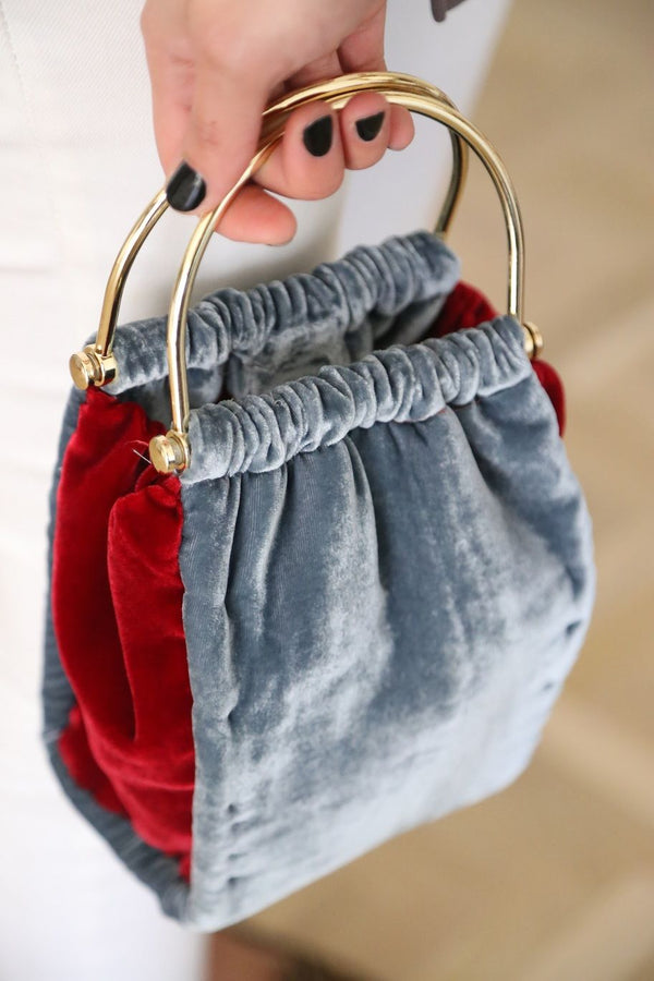 Bolso de mano en dos terciopelos
